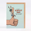 A greeting card with a kraft envelope, featuring a cartoon illustration of a person climbing a giant thumbs-up hand. The card reads, 'YOU ARE A GREAT DAD I ASKED EVERYONE AND THEY ALL AGREED' on a light blue background.