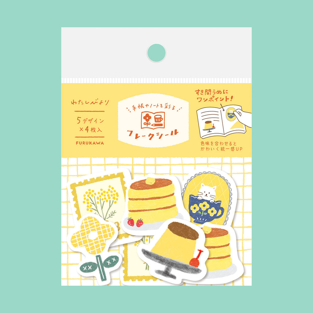 Pack of decorative stickers with cake  and floral designs on a yellow and white background