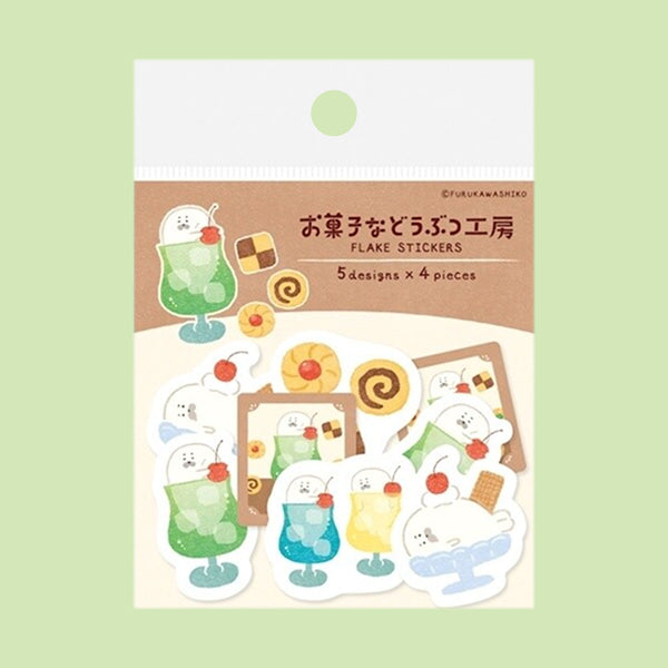 A package of cute Japanese sticker designs featuring cartoon characters in drink glass and dessert plate, displayed on a light green background.