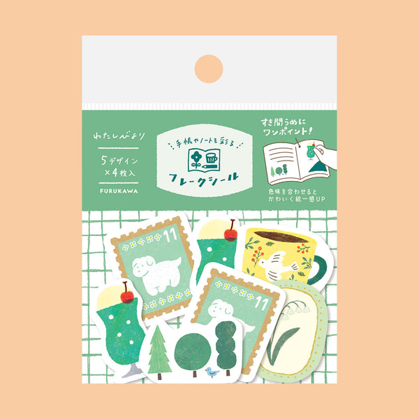 Sticker pack featuring cute green-themed stickers including a green stocking with a white dog, a yellow mug with a bird, and green trees, displayed on a peach-coloured background.