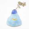 Front view of wobbly vase number 1 with leaf. Blue colours. 