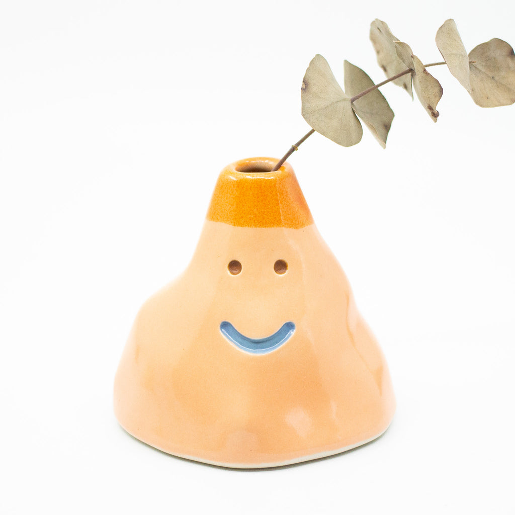 Front view of Wobbly vase number 2 with leaf. 