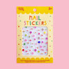 Missy Minzy nail stickers in a yellow retail package, featuring a white sticker sheet with colorful mushroom and rainbow patterns visible through a clear window.