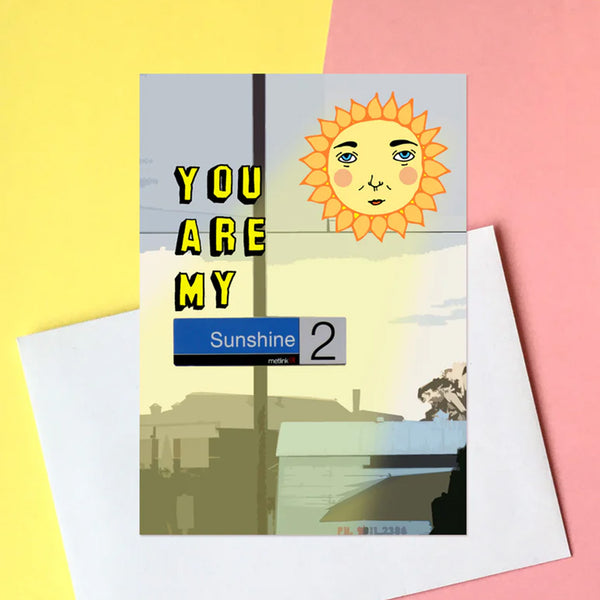 Greeting card with sun illustration and text 'You are my sunshine' on a colourful background