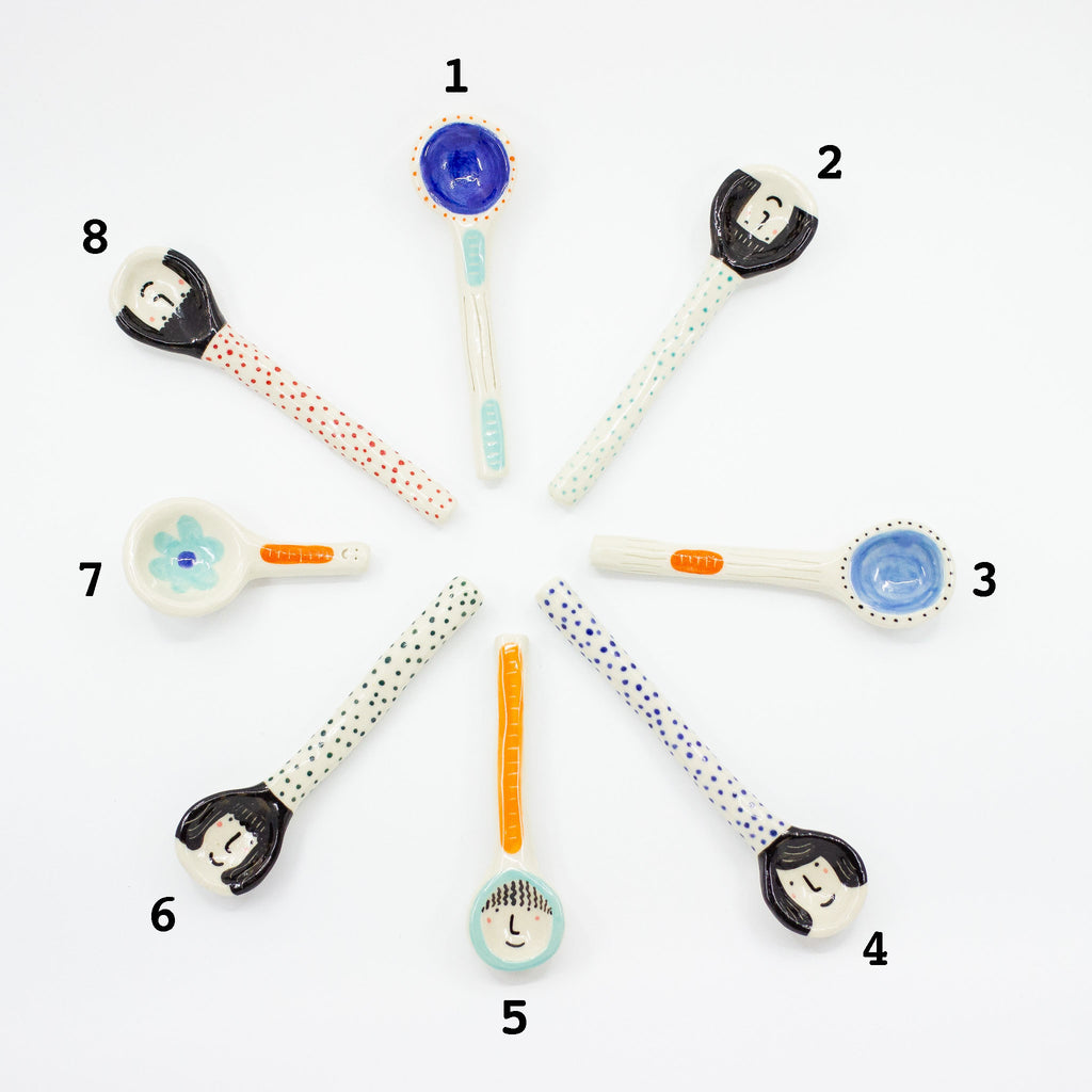A top view of the fun spoons collection. Featuring 8 spoons with different colourful and bright designs. Number from 1 to 8 so you can choose your favourite spoon. 