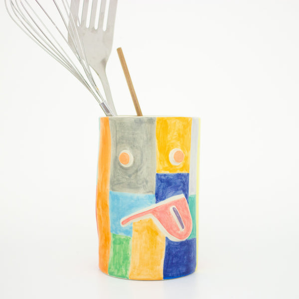Front view of the large Ciao vase. Geometric patterns, painted face. 