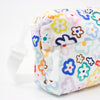 Side view of the Daisy everyday bag. Multicoloured daisy illustrations on a white background. 