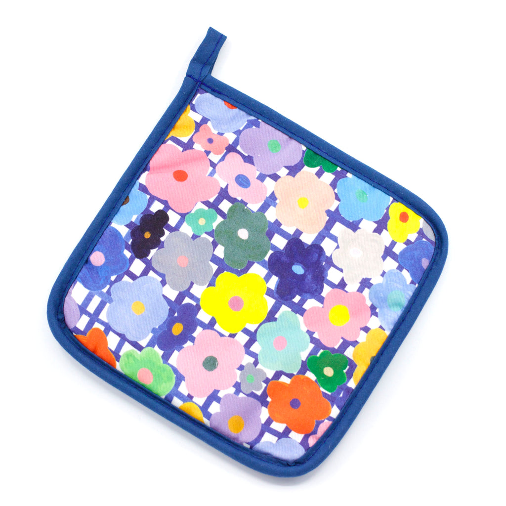 Top view of the flower pot holder. Multicoloured flowers over a white background with blue stripes. 