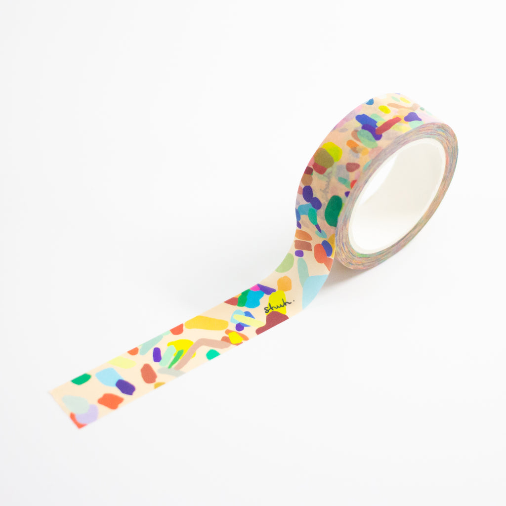 1 roll of the Hanging Out washi tape. Multicoloured splotches on a pink background. 