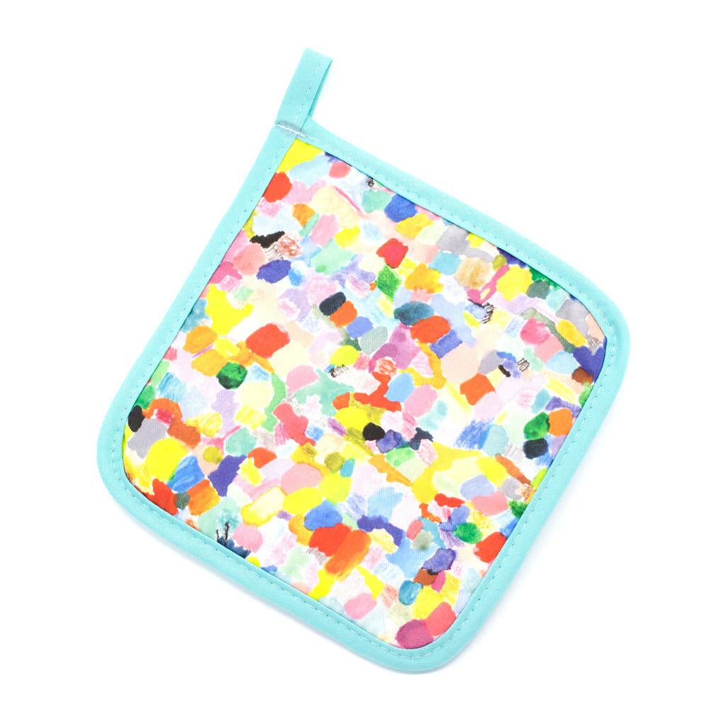 A top view of the Landscape pot holder. An impressionist representation of a mountain view. Multi coloured and abstract. 