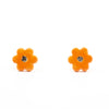 A pair of handmade ceramic stud earrings shaped like orange flowers, each with a speckled black centre. Finished with Sterling Silver posts.