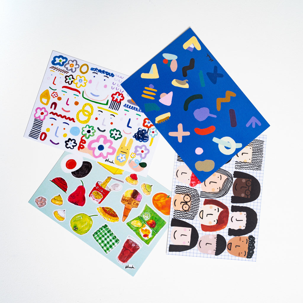 A photo showing all 4 post cards in the shuh. post card collection. 