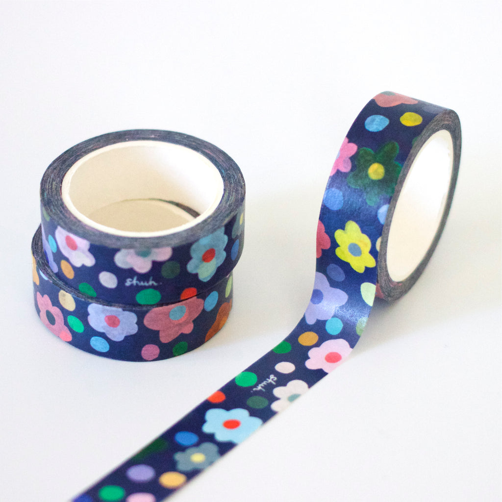 3 rolls of the 15mm Salad Washi Tape. Multicoloured flowers on a blue background. 