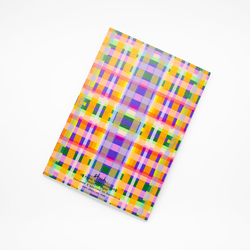 Back view of the Tartan notebook, with multicoloured tartan print. Purple, blue, green, yellow, and orange. 