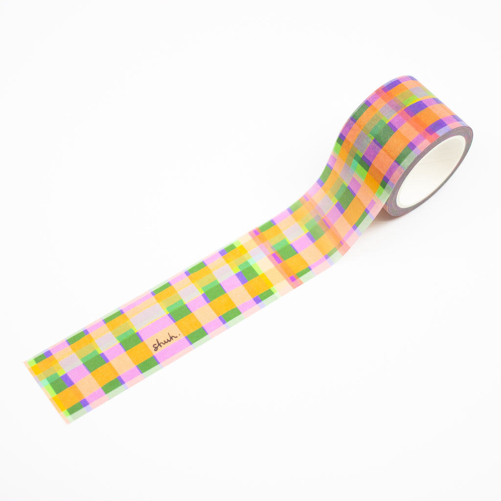 1 roll of the Tartan print washi tape. A multicoloured plaid pattern, with purple, green, orange, yellow, and blue.