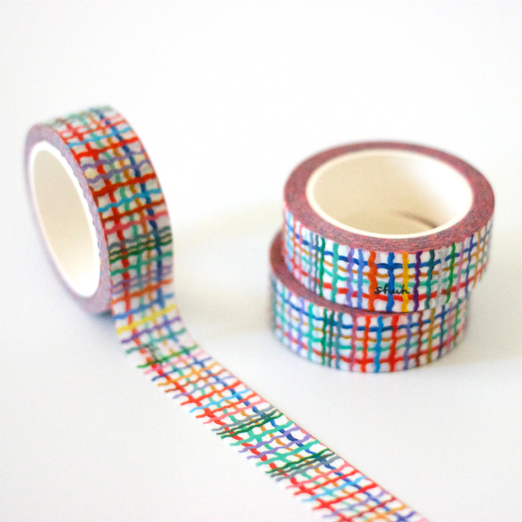 3 rolls of the 15mm Wave washi tape. Multicoloured Wavy lines forming a plaid pattern. 